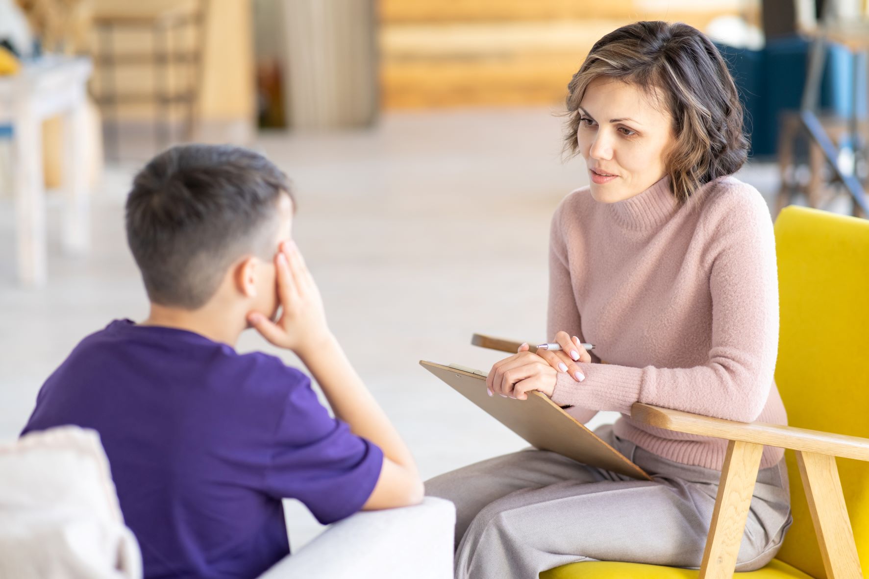 School psychologist with student