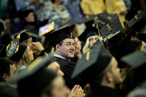 Students at a graduation commencement.